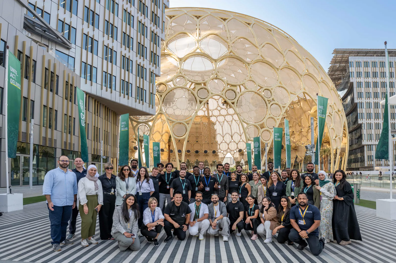 The Expo City Dubai Marketing and Communications team in front of Al Wasl Plaza